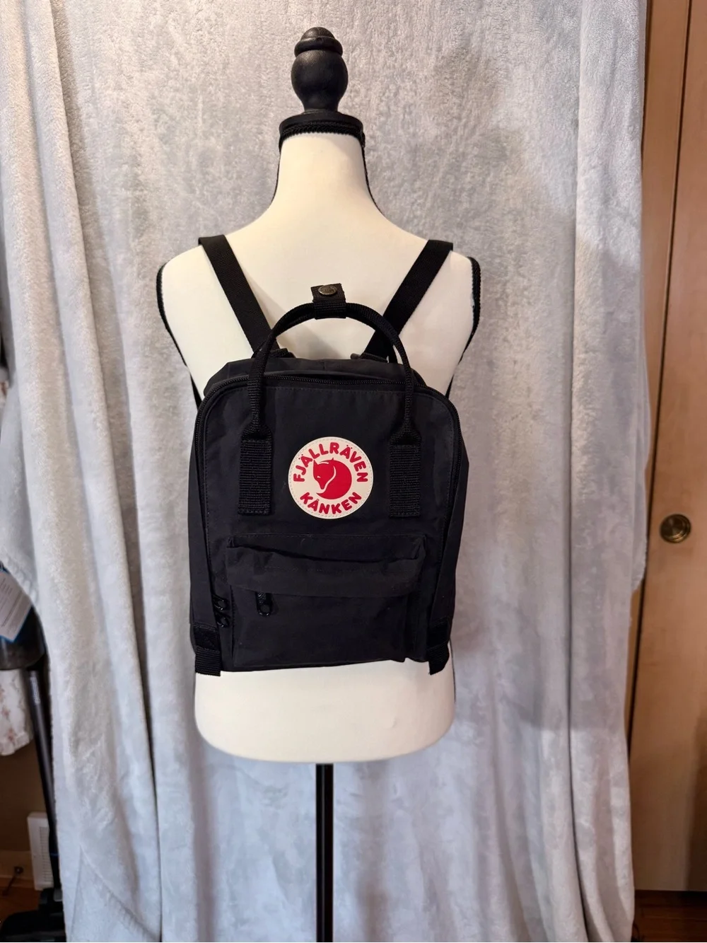 Fjallraven Kanken Mini Backpack in Black with Red Logo
